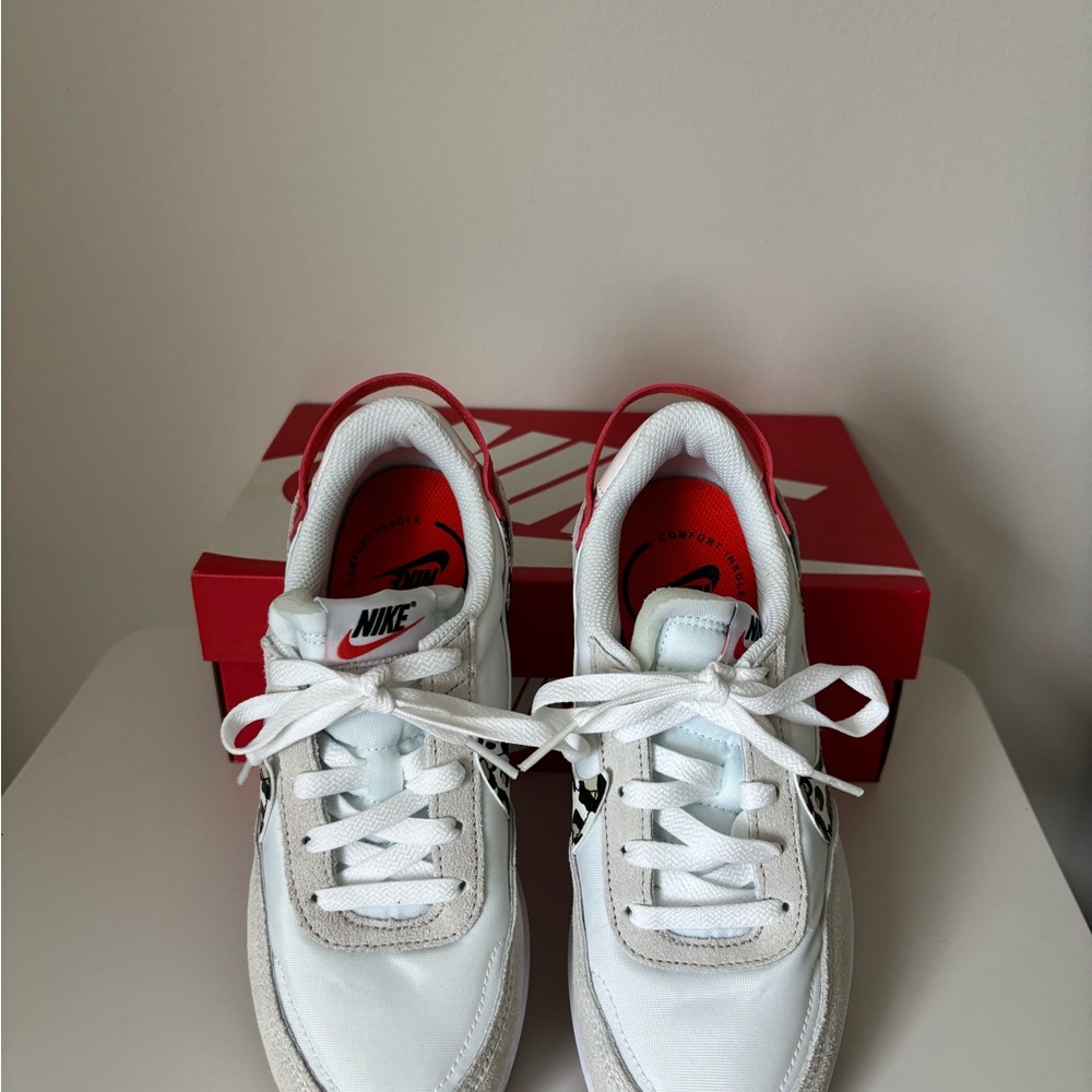 Nike Women’s White and leopard design Sneakers